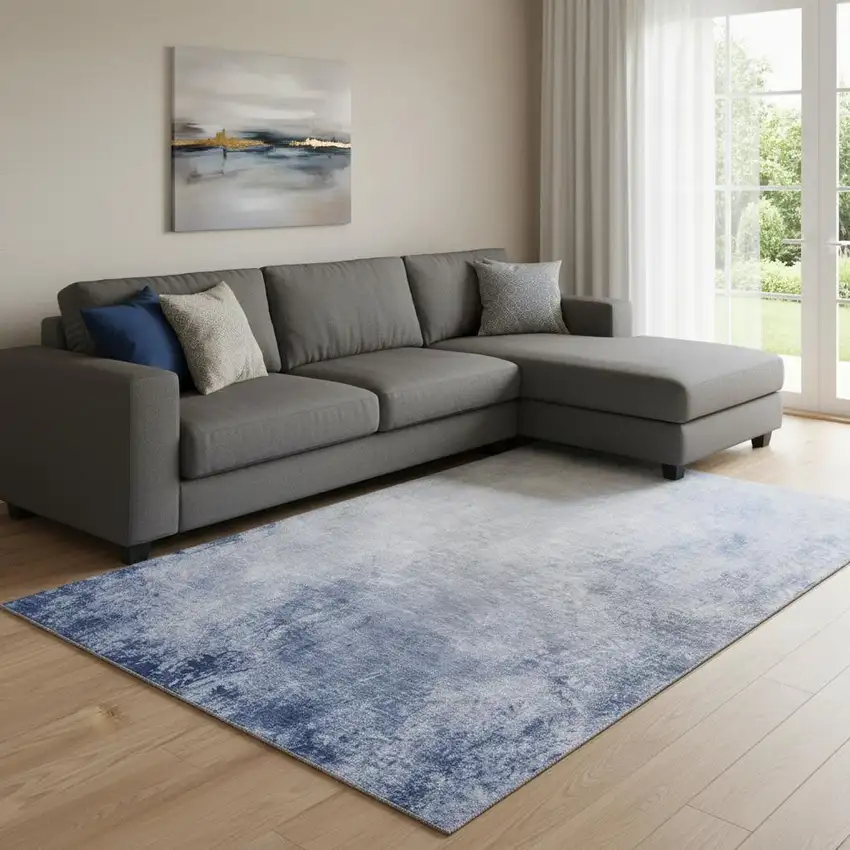 Blue And Ivory Abstract Washable Area Rug With UV Protection Photo 1