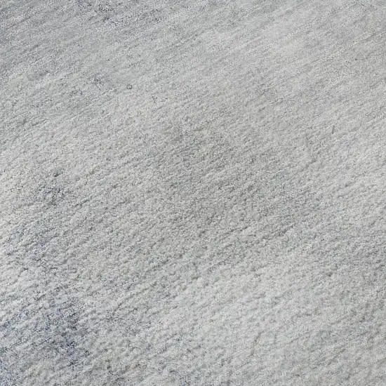 Blue And Ivory Abstract Washable Area Rug With UV Protection Photo 1