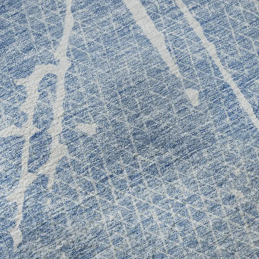 Blue And Ivory Abstract Washable Area Rug With UV Protection Photo 1