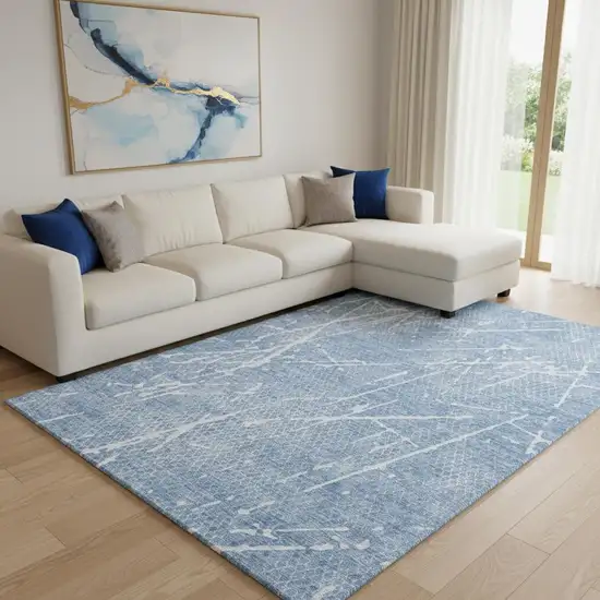 Blue And Ivory Abstract Washable Area Rug With UV Protection Photo 2