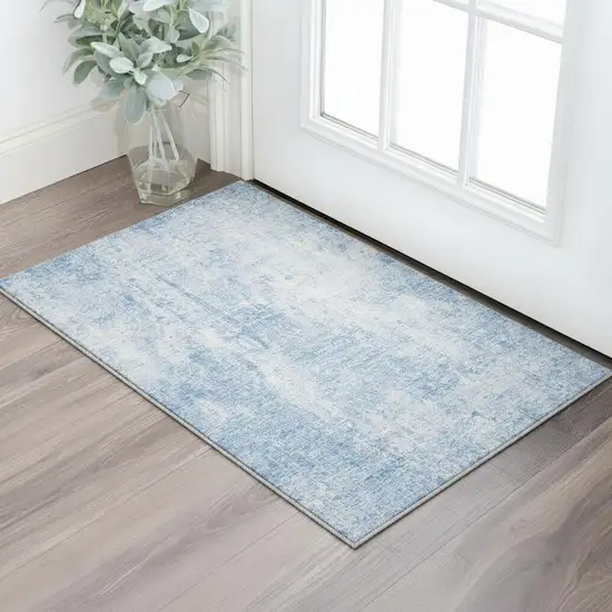 Blue And Ivory Abstract Washable Area Rug With UV Protection Photo 3