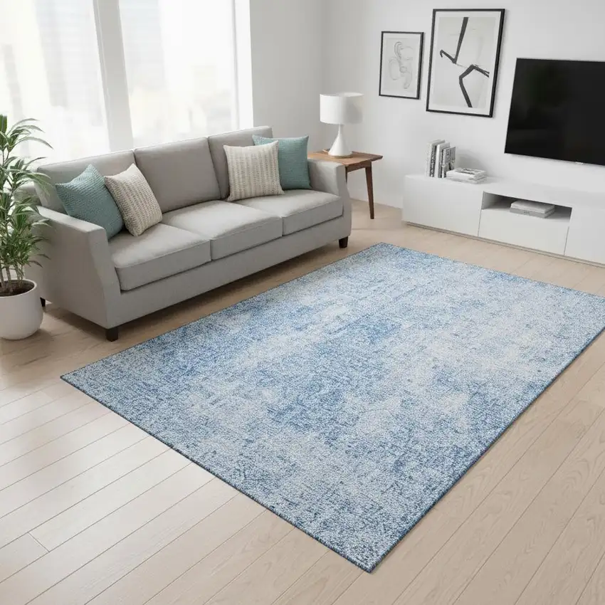 Blue And Ivory Abstract Washable Area Rug With UV Protection Photo 1