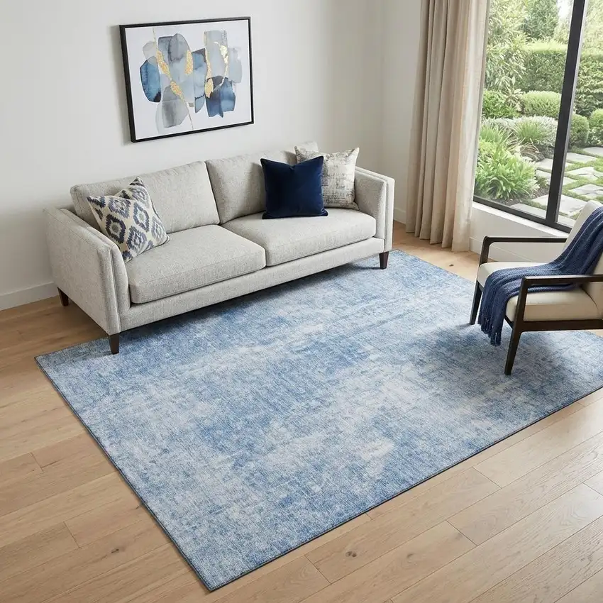 Blue And Ivory Abstract Washable Area Rug With UV Protection Photo 1