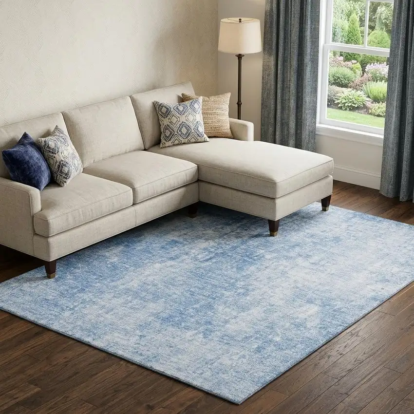 Blue And Ivory Abstract Washable Area Rug With UV Protection Photo 1