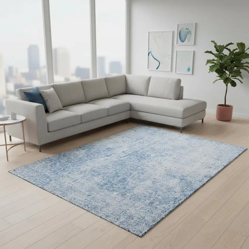 Blue And Ivory Abstract Washable Area Rug With UV Protection Photo 1