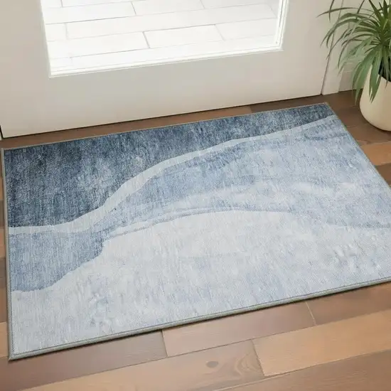Blue And Ivory Abstract Washable Area Rug With UV Protection Photo 2