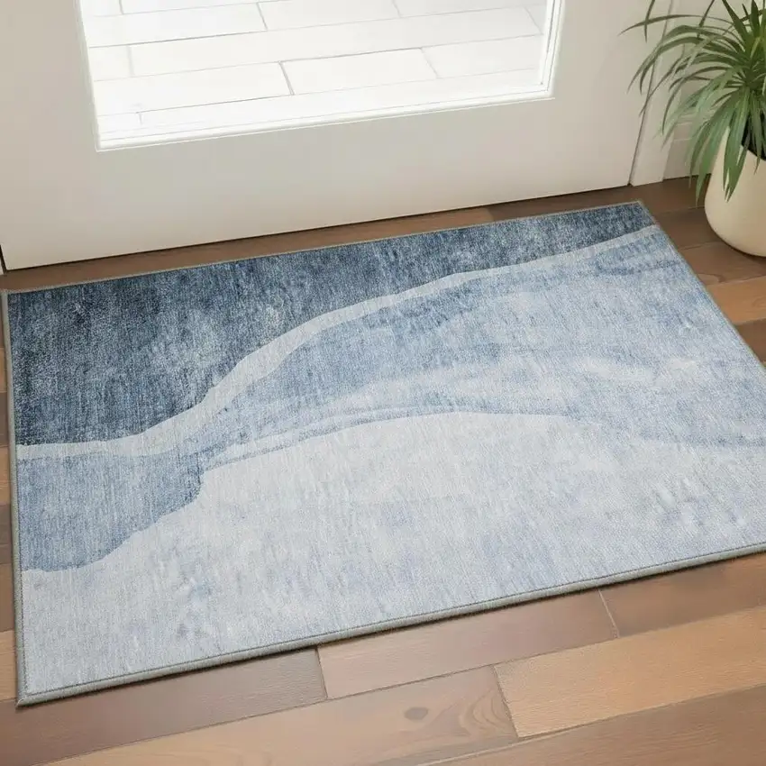 Blue And Ivory Abstract Washable Area Rug With UV Protection Photo 2