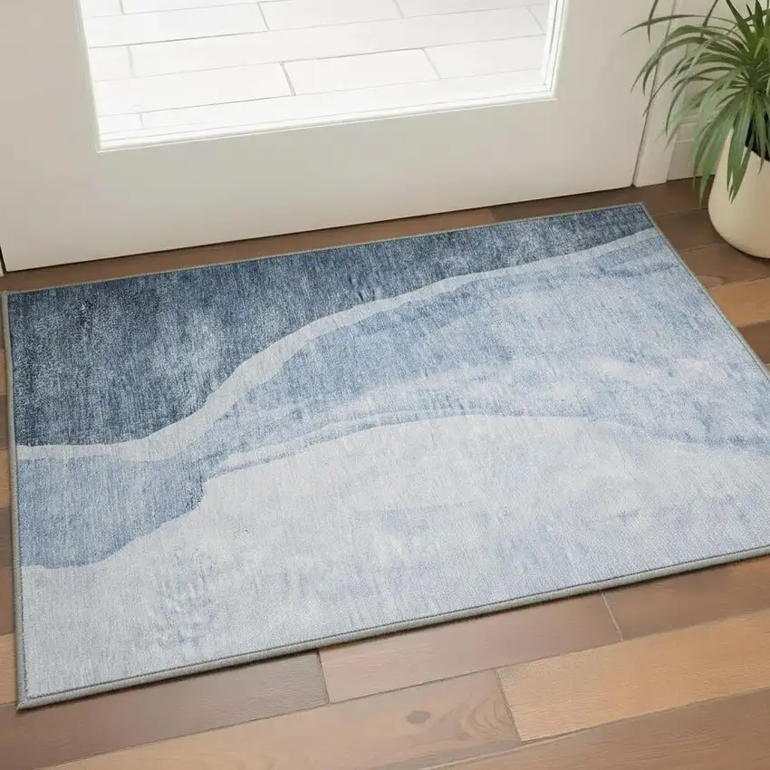 Blue And Ivory Abstract Washable Area Rug With UV Protection Photo 3