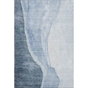 Photo of Blue And Ivory Abstract Washable Area Rug With UV Protection