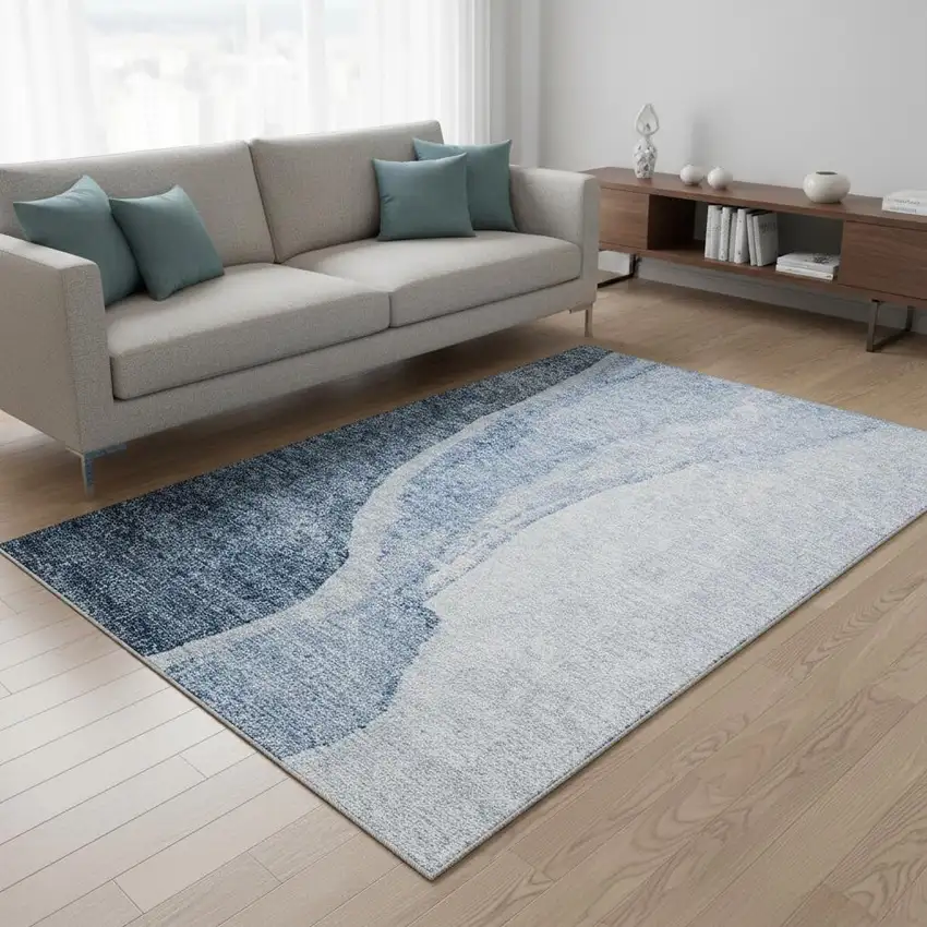 Blue And Ivory Abstract Washable Area Rug With UV Protection Photo 1