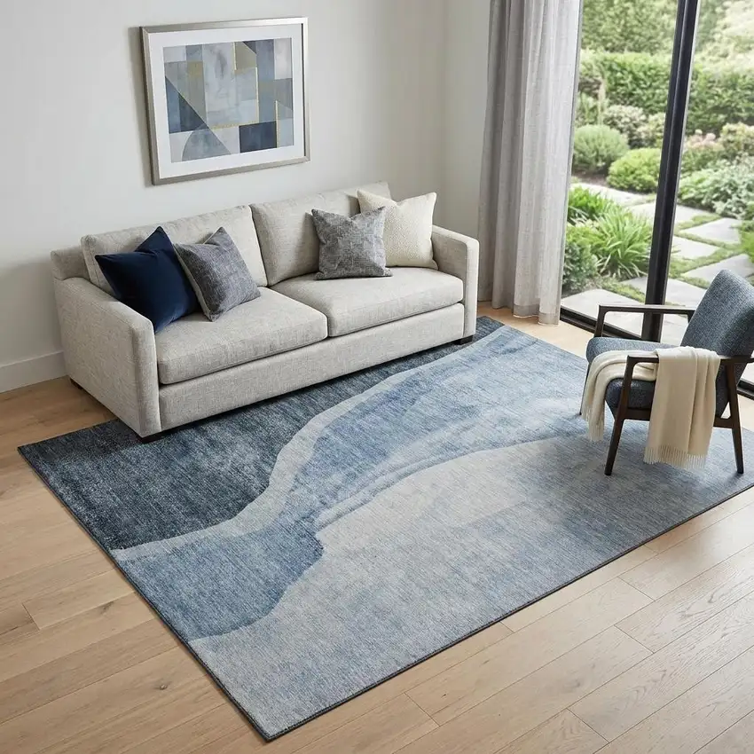 Blue And Ivory Abstract Washable Area Rug With UV Protection Photo 1