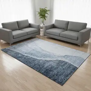 Photo of Blue And Ivory Abstract Washable Area Rug With UV Protection