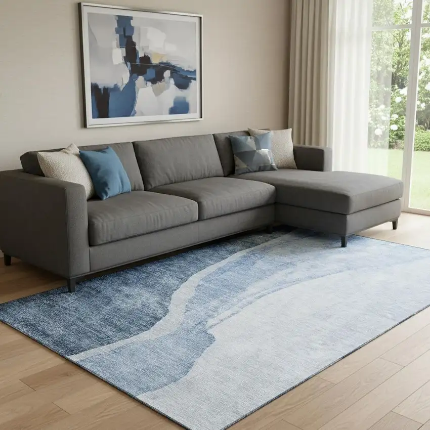 Blue And Ivory Abstract Washable Area Rug With UV Protection Photo 1