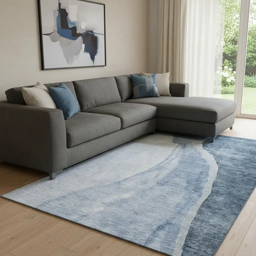 Blue And Ivory Abstract Washable Area Rug With UV Protection Photo 1