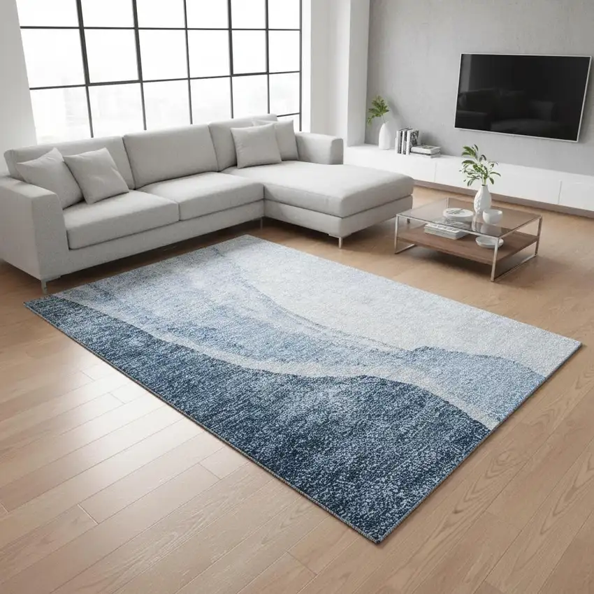 Blue And Ivory Abstract Washable Area Rug With UV Protection Photo 1