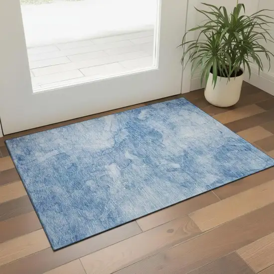 Blue And Ivory Abstract Washable Area Rug With UV Protection Photo 1