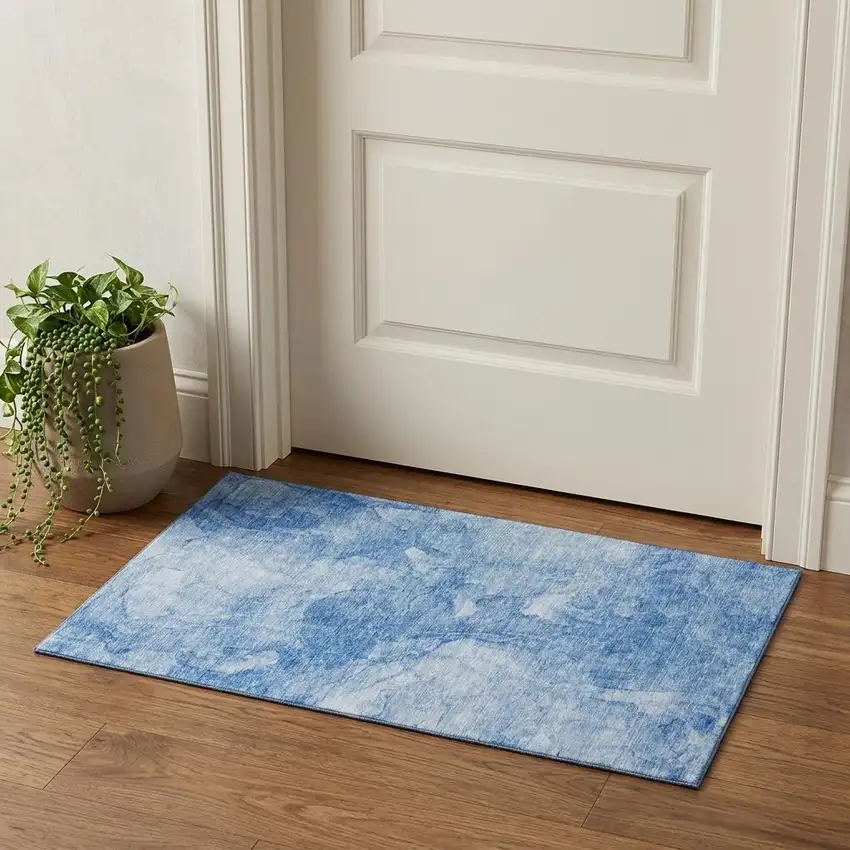 Blue And Ivory Abstract Washable Area Rug With UV Protection Photo 1