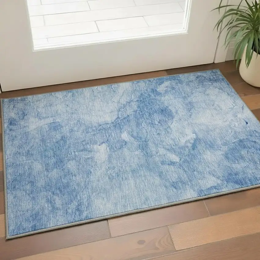 Blue And Ivory Abstract Washable Area Rug With UV Protection Photo 2