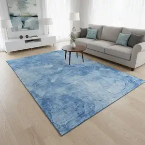 Photo of Blue And Ivory Abstract Washable Area Rug With UV Protection