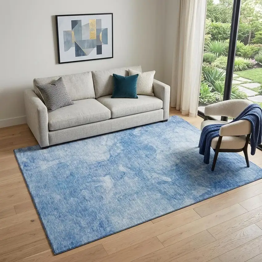 Blue And Ivory Abstract Washable Area Rug With UV Protection Photo 1