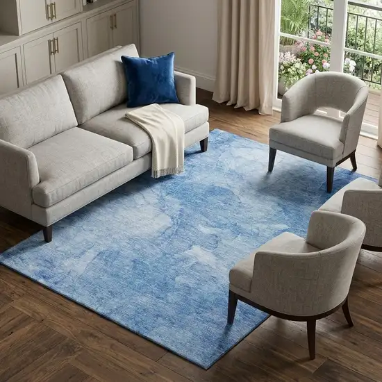Blue And Ivory Abstract Washable Area Rug With UV Protection Photo 1