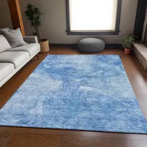 Photo of Blue And Ivory Abstract Washable Area Rug With UV Protection