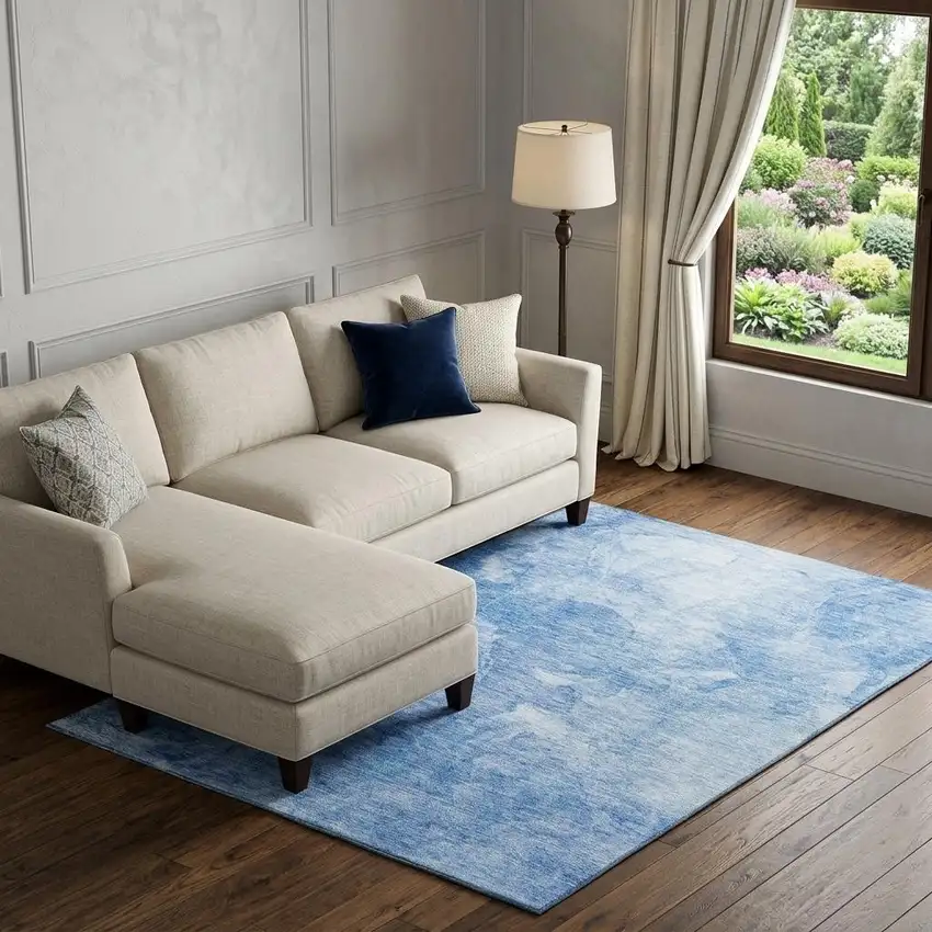 Blue And Ivory Abstract Washable Area Rug With UV Protection Photo 1
