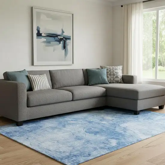 Blue And Ivory Abstract Washable Area Rug With UV Protection Photo 1