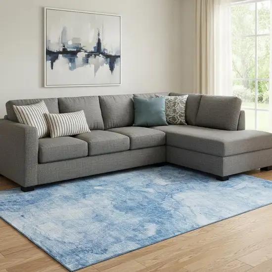 Blue And Ivory Abstract Washable Area Rug With UV Protection Photo 1