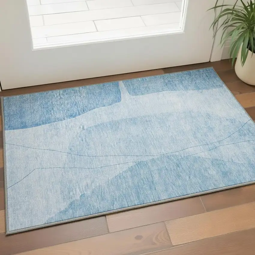 Blue And Ivory Abstract Washable Area Rug With UV Protection Photo 3