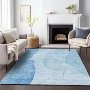 Photo of Blue And Ivory Abstract Washable Area Rug With UV Protection
