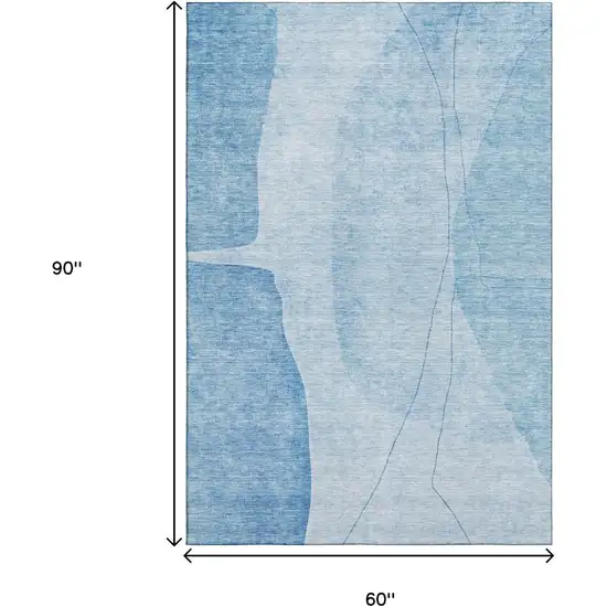 Blue And Ivory Abstract Washable Area Rug With UV Protection Photo 3