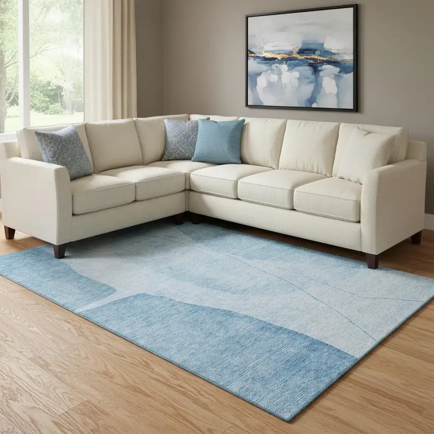 Blue And Ivory Abstract Washable Area Rug With UV Protection Photo 1