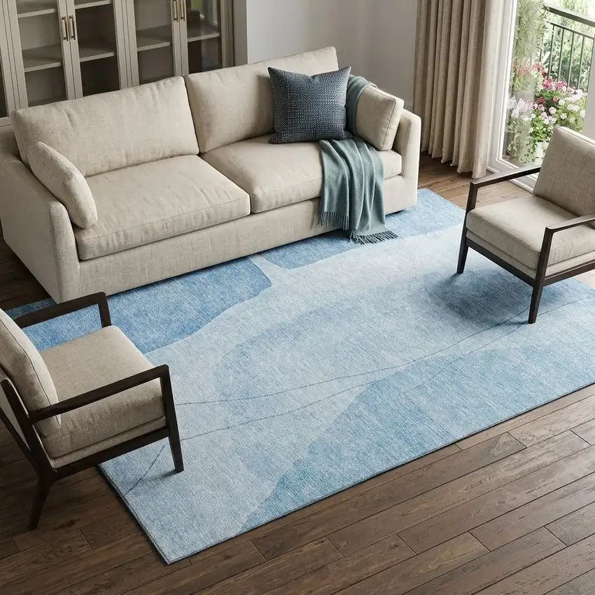 Blue And Ivory Abstract Washable Area Rug With UV Protection Photo 1