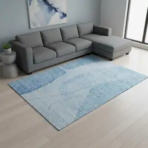 Photo of Blue And Ivory Abstract Washable Area Rug With UV Protection