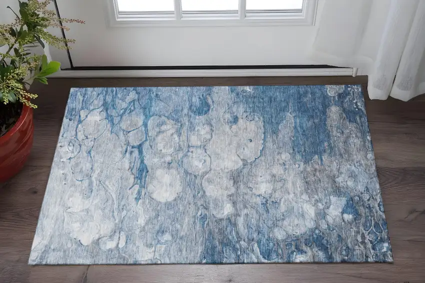 Blue And Ivory Abstract Washable Area Rug With UV Protection Photo 3