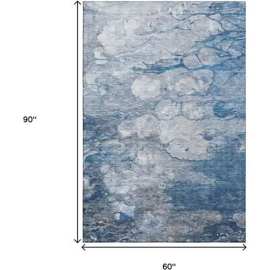 Blue And Ivory Abstract Washable Area Rug With UV Protection Photo 3