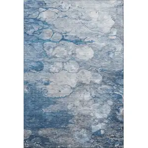 Photo of Blue And Ivory Abstract Washable Area Rug With UV Protection
