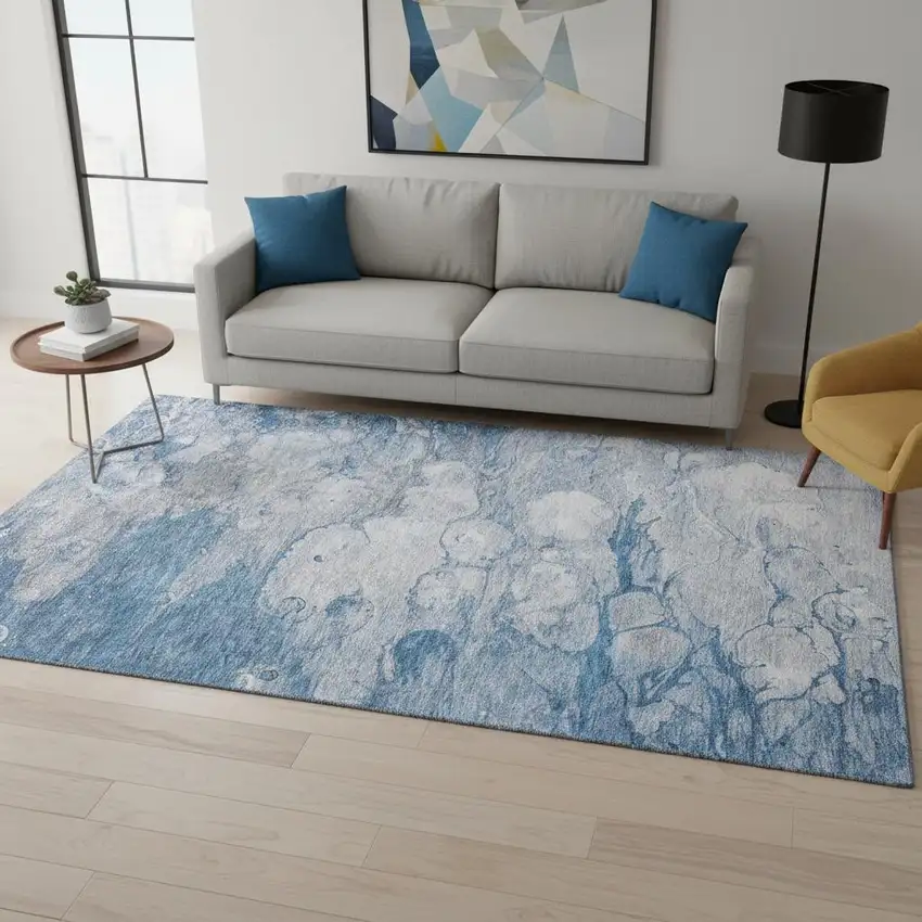 Blue And Ivory Abstract Washable Area Rug With UV Protection Photo 1