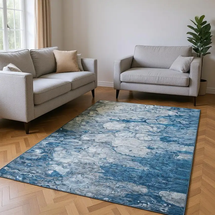 Blue And Ivory Abstract Washable Area Rug With UV Protection Photo 1