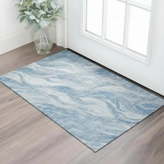 Blue And Ivory Abstract Washable Area Rug With UV Protection Photo 1