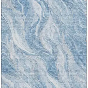 Photo of Blue And Ivory Abstract Washable Area Rug With UV Protection