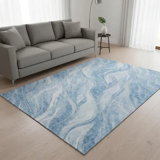 Blue And Ivory Abstract Washable Area Rug With UV Protection Photo 1