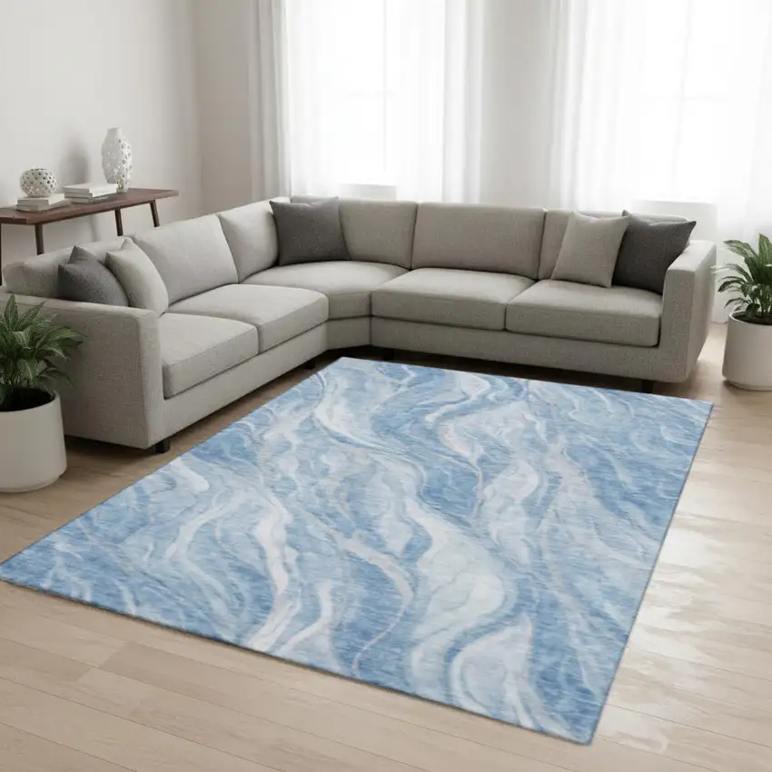 Blue And Ivory Abstract Washable Area Rug With UV Protection Photo 1