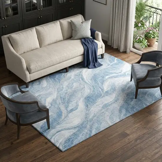Blue And Ivory Abstract Washable Area Rug With UV Protection Photo 1