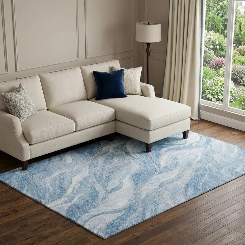 Blue And Ivory Abstract Washable Area Rug With UV Protection Photo 1