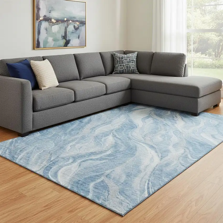 Blue And Ivory Abstract Washable Area Rug With UV Protection Photo 1