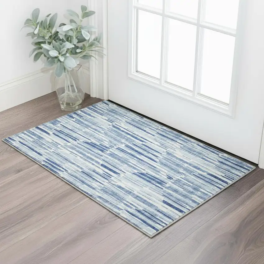 Blue And Ivory Abstract Washable Area Rug With UV Protection Photo 2