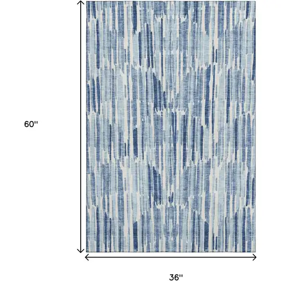 Blue And Ivory Abstract Washable Area Rug With UV Protection Photo 3