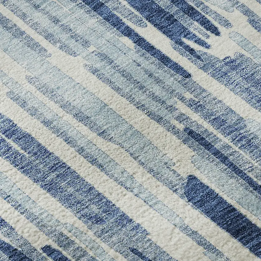 Blue And Ivory Abstract Washable Area Rug With UV Protection Photo 9